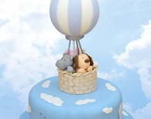Up, Up and Away! - The cloud cutters from our Country Silhouette Set and Basketweave embosser has been used on this adventurous cake.